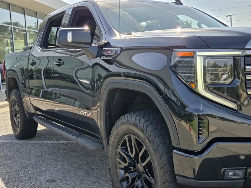 Used 2024 Onyx Black GMC 4WD CREW CAB 147" AT4 image 24