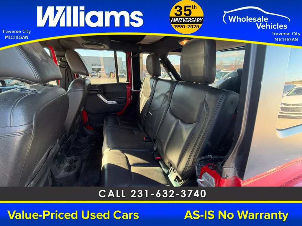 Used 2013 Flame Red Jeep Unlimited Sahara image 36