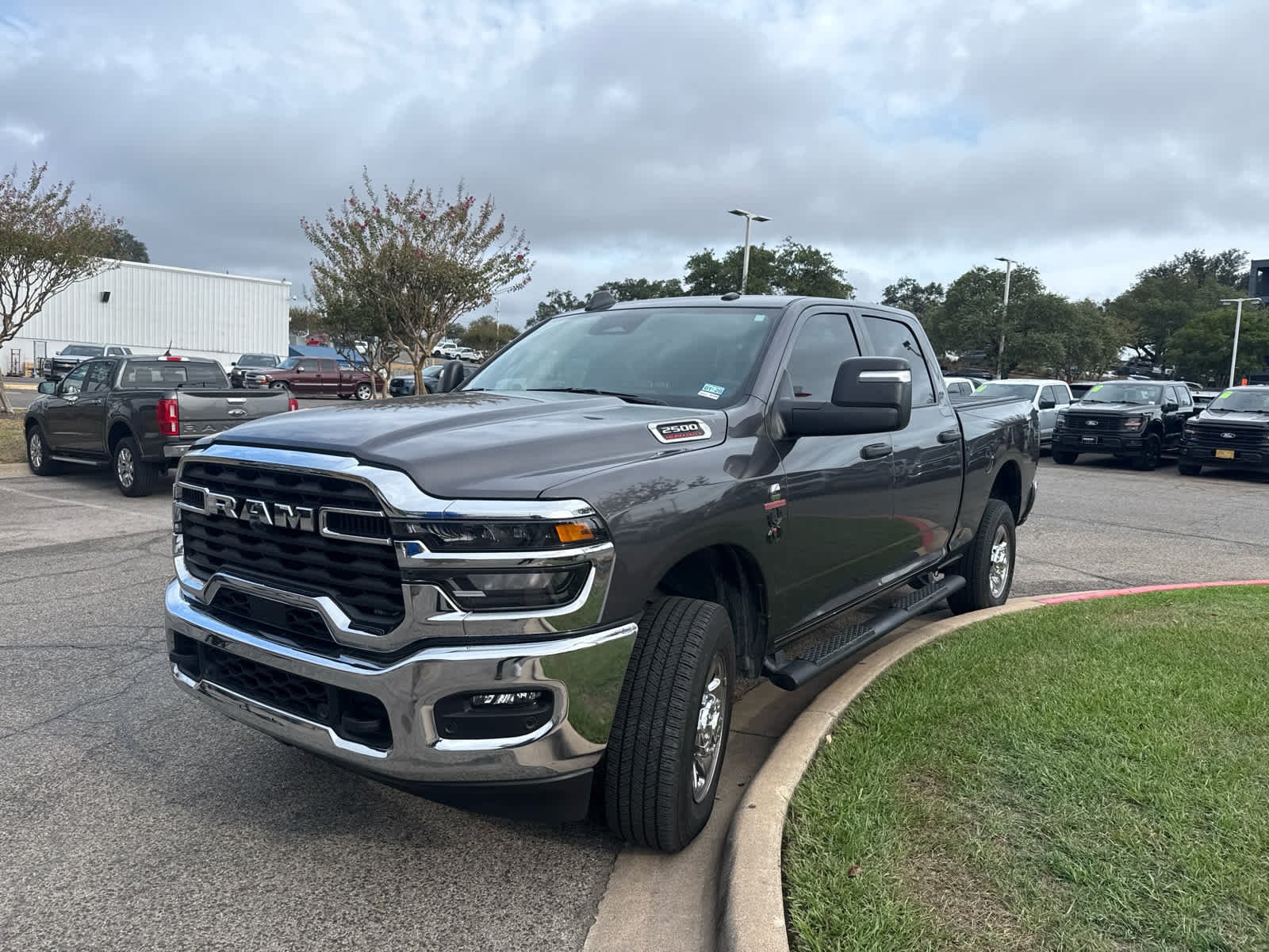 Used 2025 Granite Crystal Metallic Clearcoat Ram Tradesman image 3