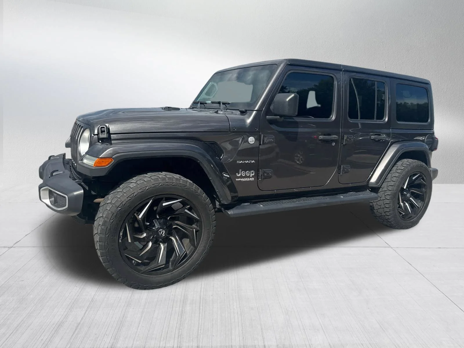 Used 2020 Jeep Wrangler Unlimited Sahara with VIN 1C4HJXEN5LW156064 for sale in Kansas City