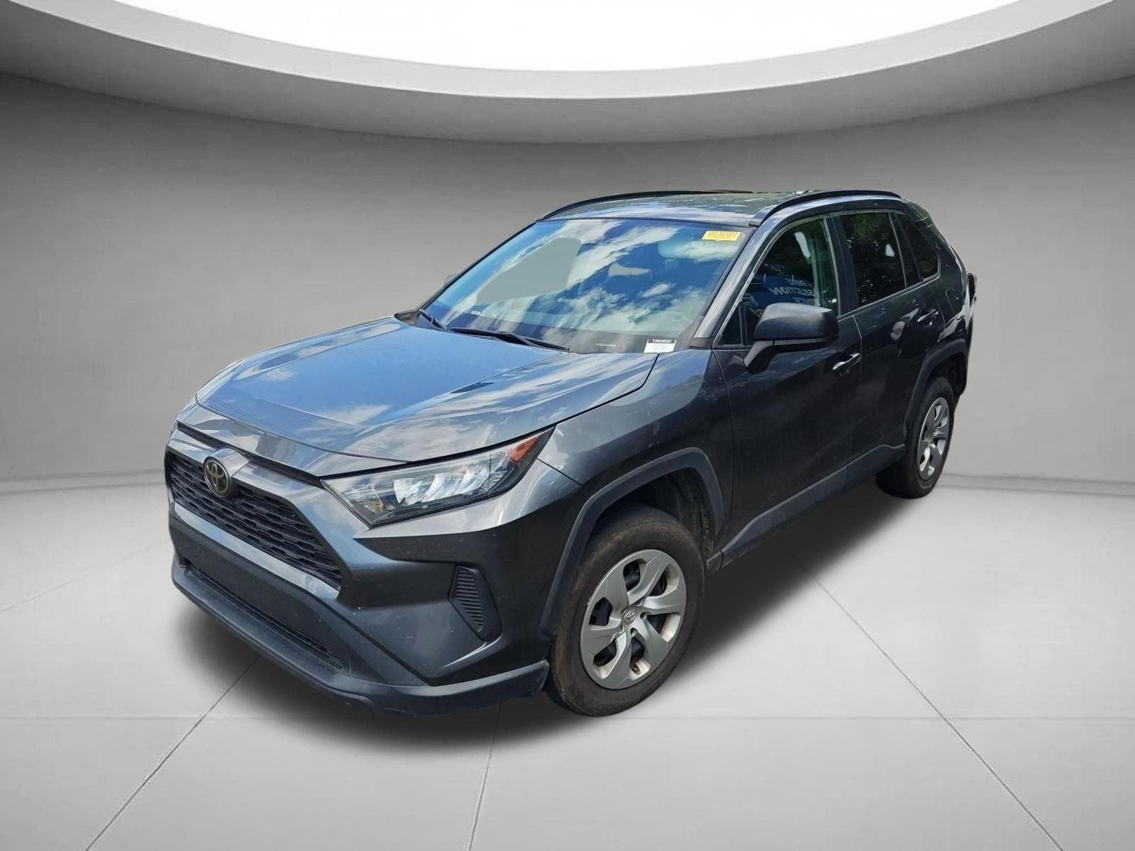 Used 2021 Magnetic Gray Metallic Toyota LE image 1