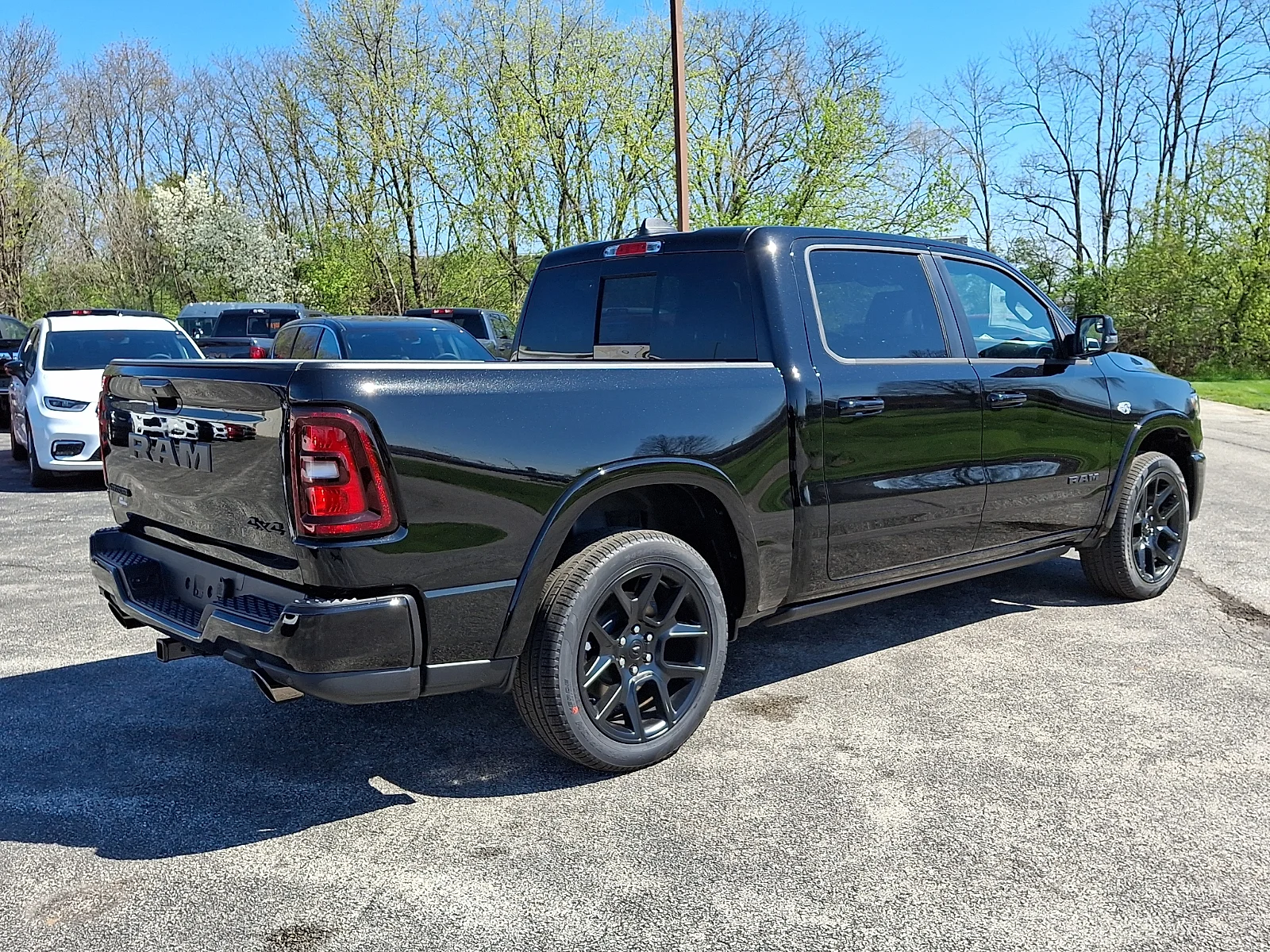 New 2026 Diamond Black Crystal Pearl-Coat Exterior Paint RAM Laramie image 8