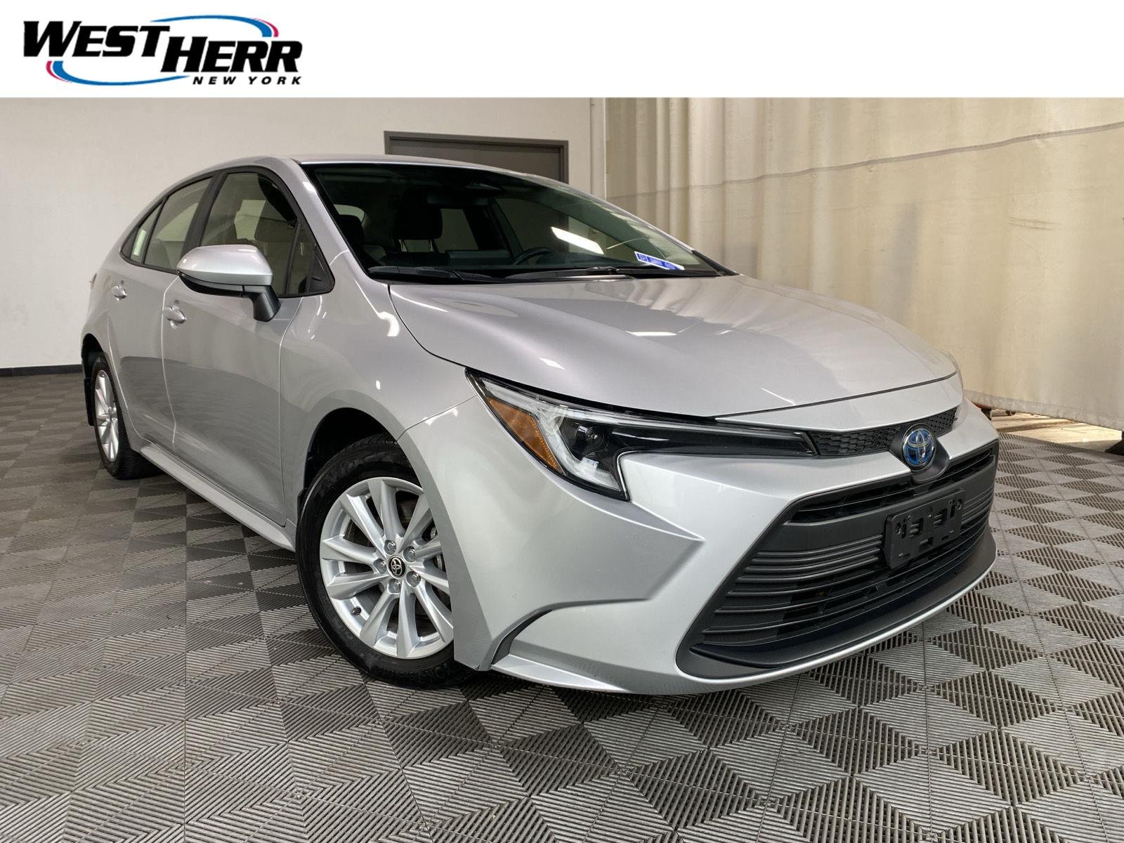 Used 2024 Classic Silver Metallic Toyota Hybrid LE image 1