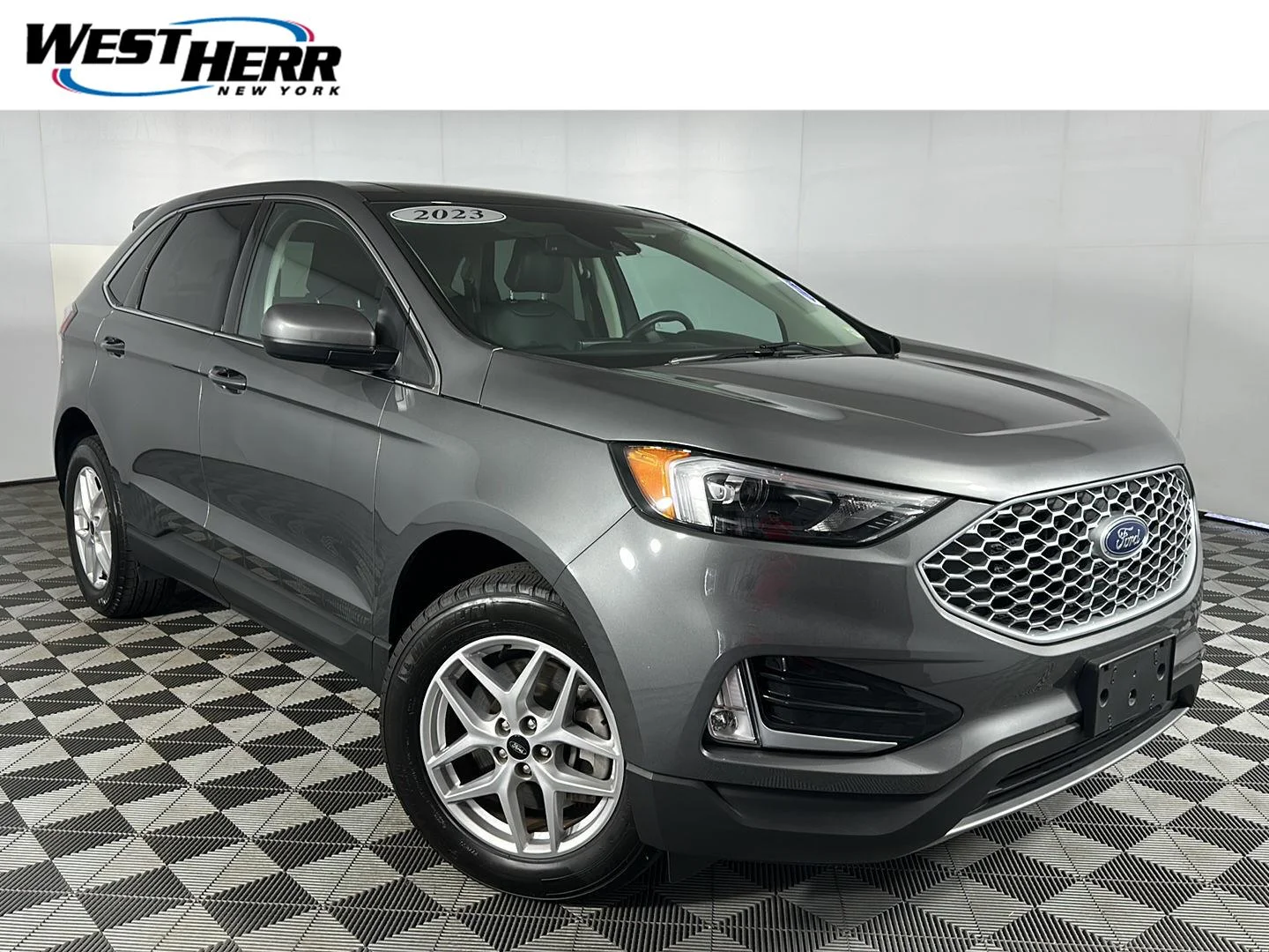 Used 2023 Carbonized Gray Ford SEL image 1