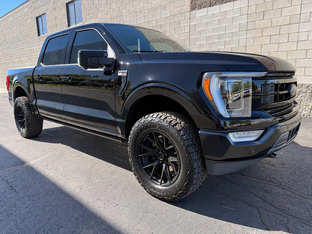 Used 2023 Agate Black Metallic Ford LARIAT 4WD SUPERCREW 5.5 BOX image 2