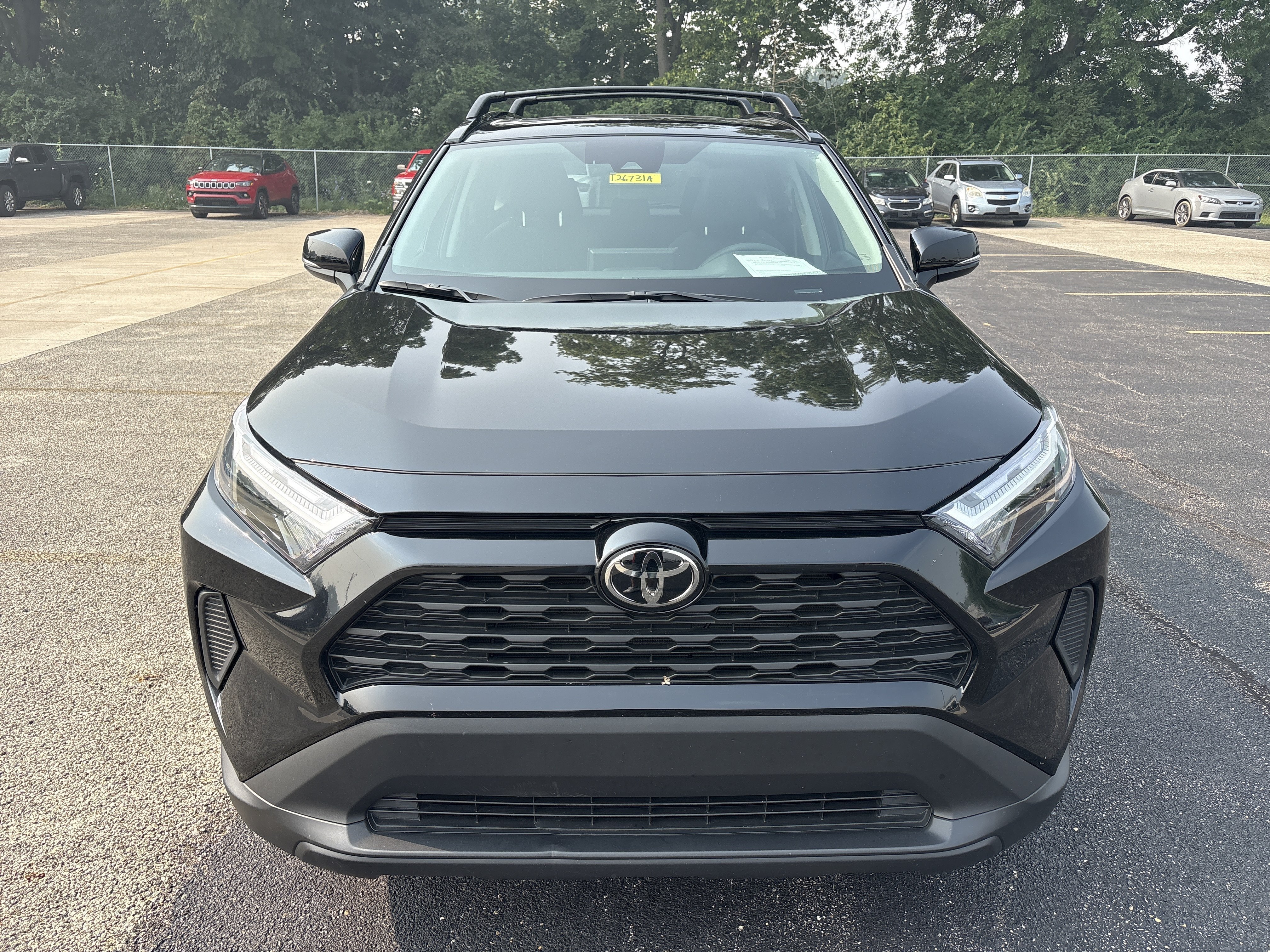 Used 2024 Midnight Black Metallic Toyota XLE image 4
