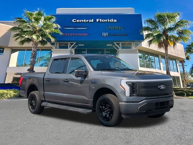 Used 2025 Ford F-150 Lightning XLT with VIN 1FTVW3LK3SWG01874 for sale in Orlando, FL