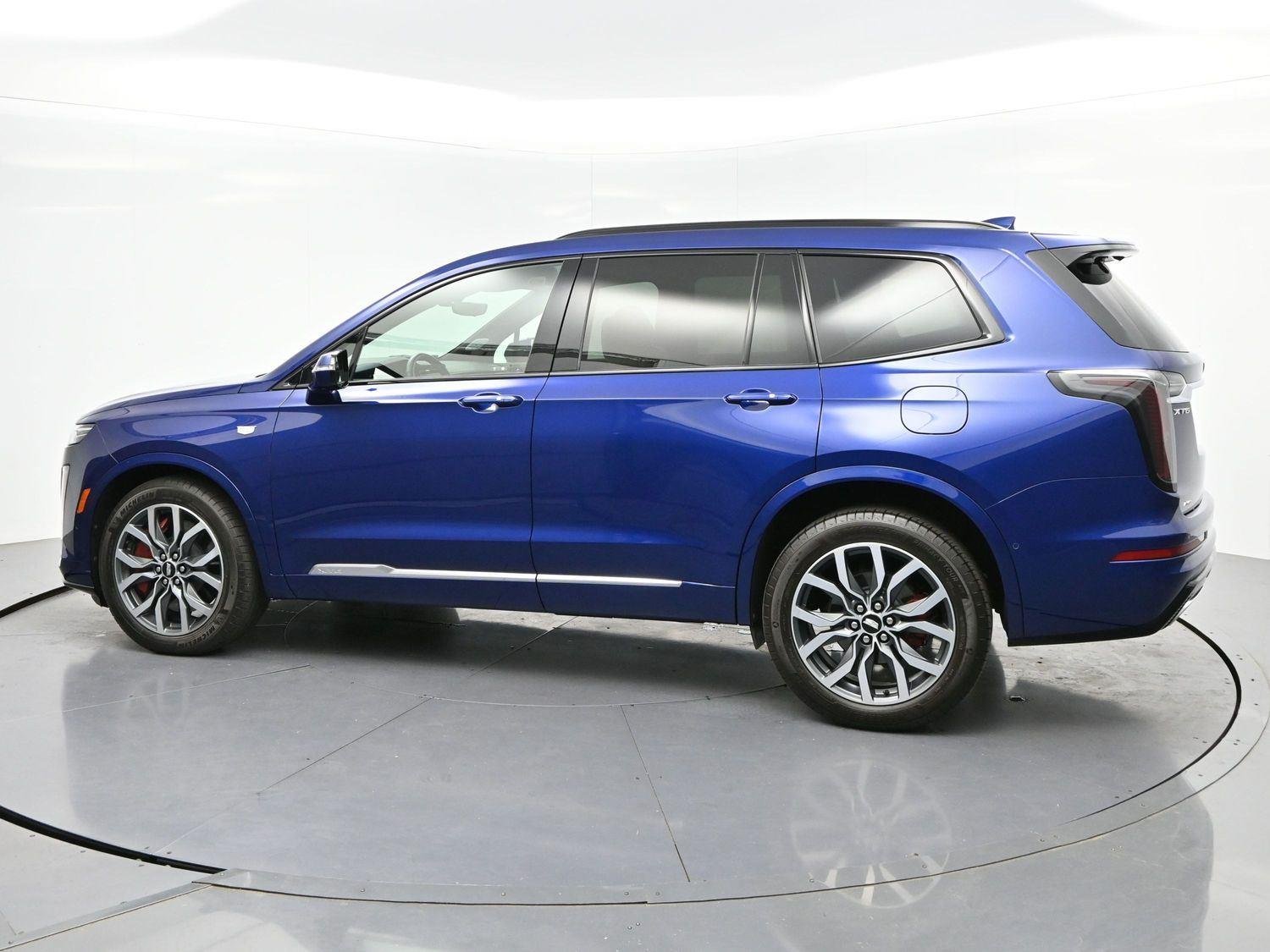 Used 2024 Opulent Blue Metallic Cadillac Sport image 4