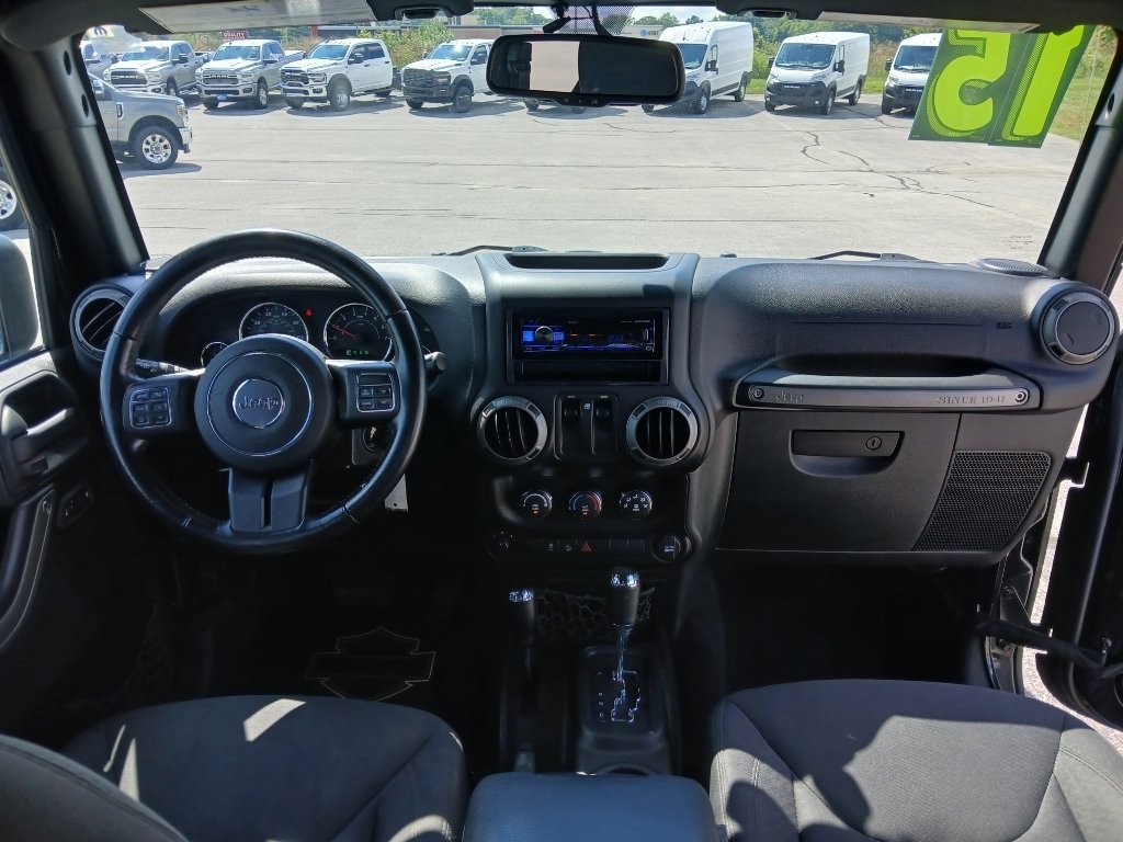 Used 2015 Black Clearcoat Jeep Sport image 13