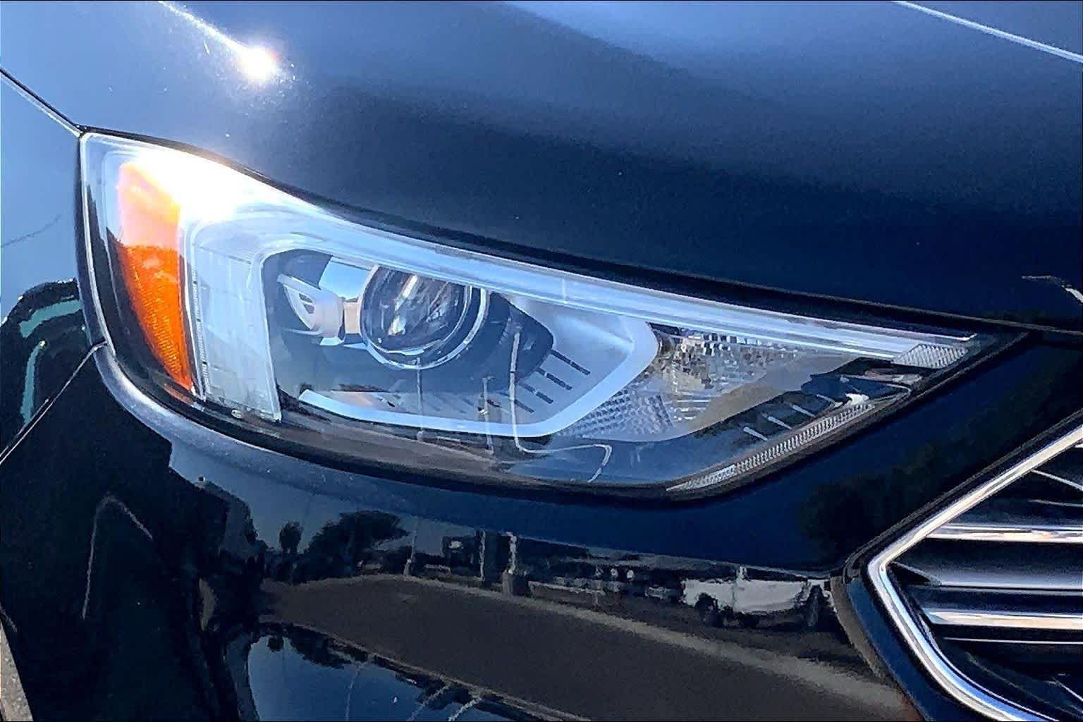 Certified Used 2022 Agate Black Metallic Ford SEL image 28