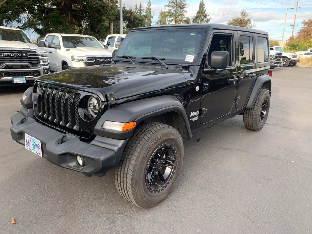 Used 2021 Black Clearcoat Jeep Unlimited Sport S image 1