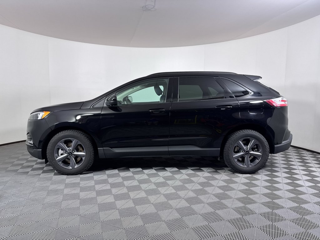 Used 2024 Agate Black Metallic Ford SEL image 12