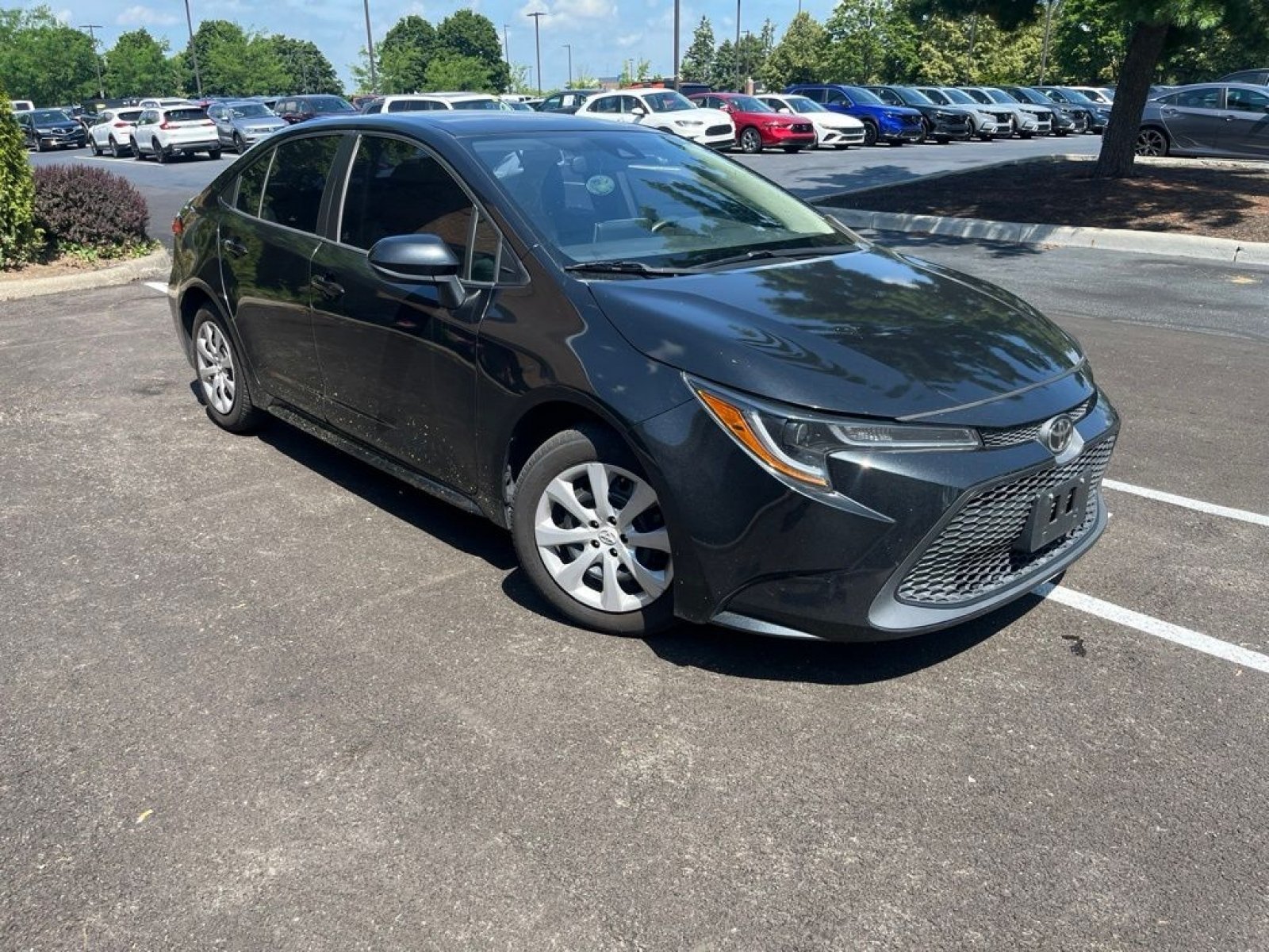 Used 2021 Black Sand Pearl Toyota LE image 4