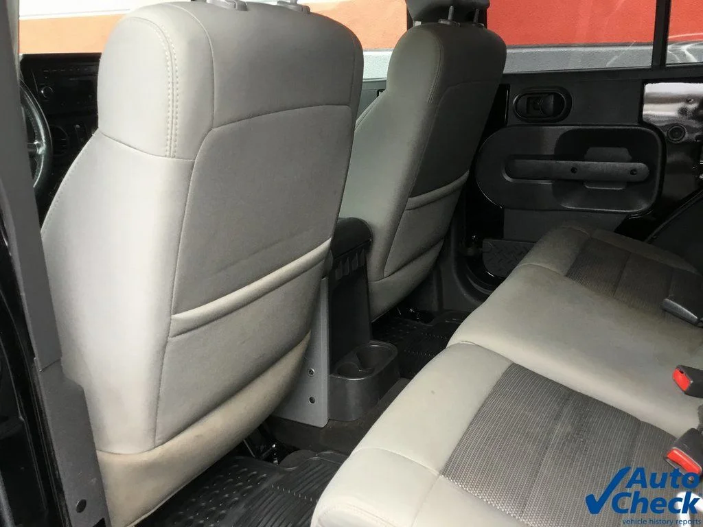 Used 2010 Black Jeep Unlimited Sport image 21