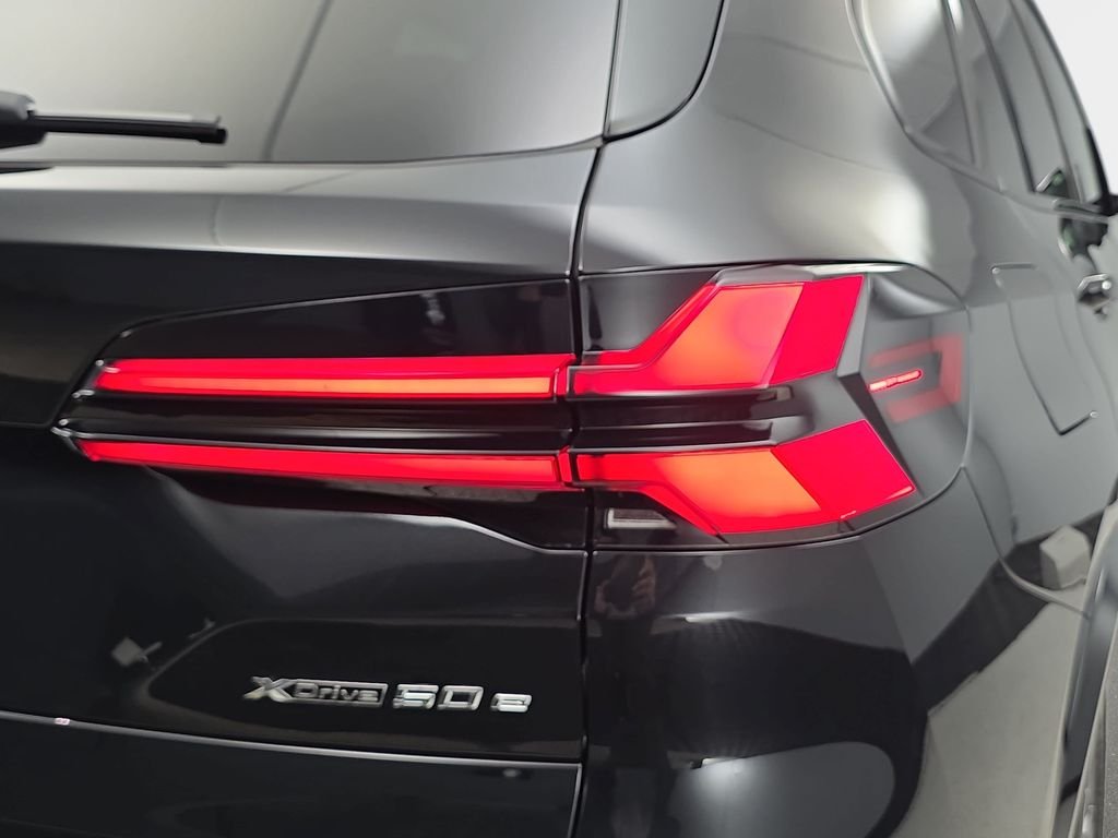 New 2026 Black Sapphire Metallic BMW xDrive50e image 33