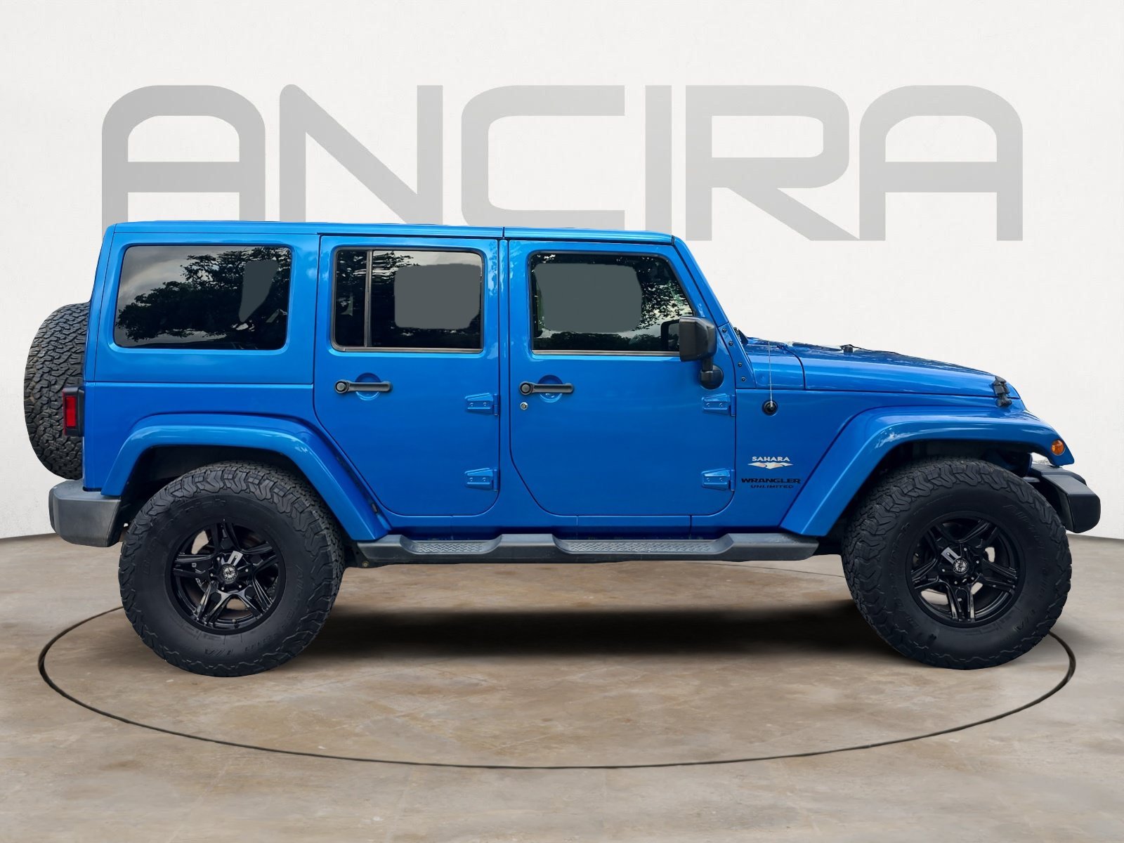 Used 2015 Hydro Blue Pearl Coat Jeep Sahara image 11