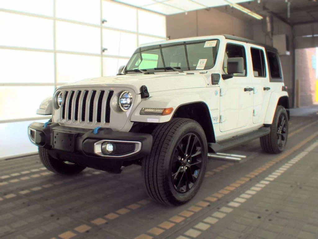 Used 2023 White Jeep Sahara 4xe image 1