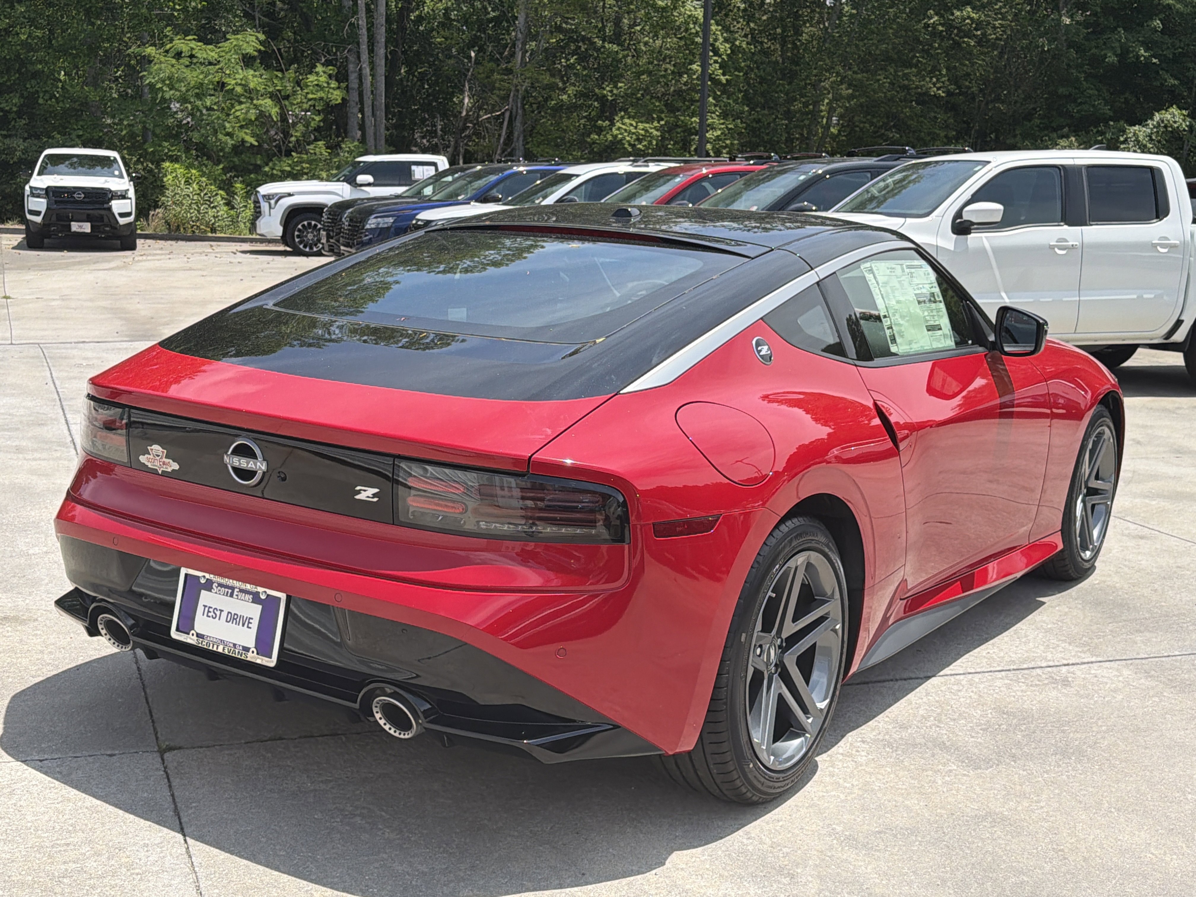 New 2026 Solid Red/Super Black Nissan Sport image 8