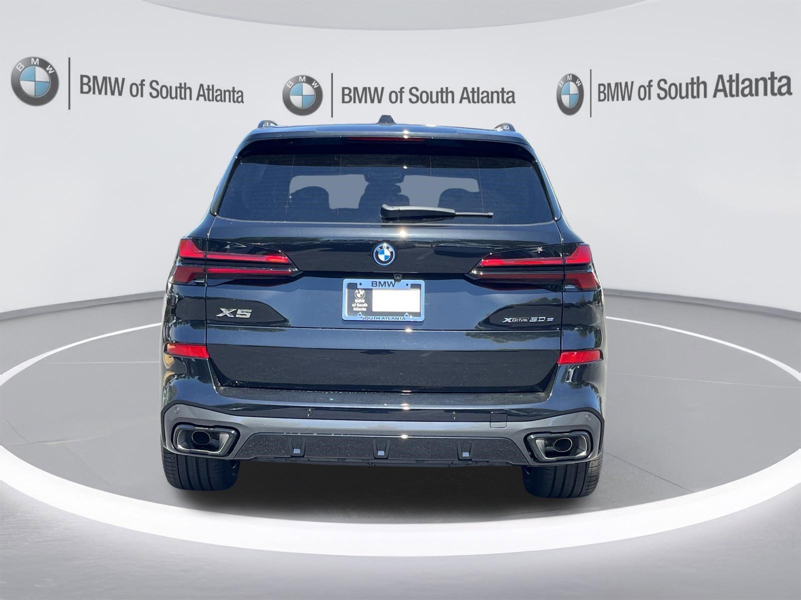 New 2026 Black Sapphire Metallic BMW xDrive50e image 25