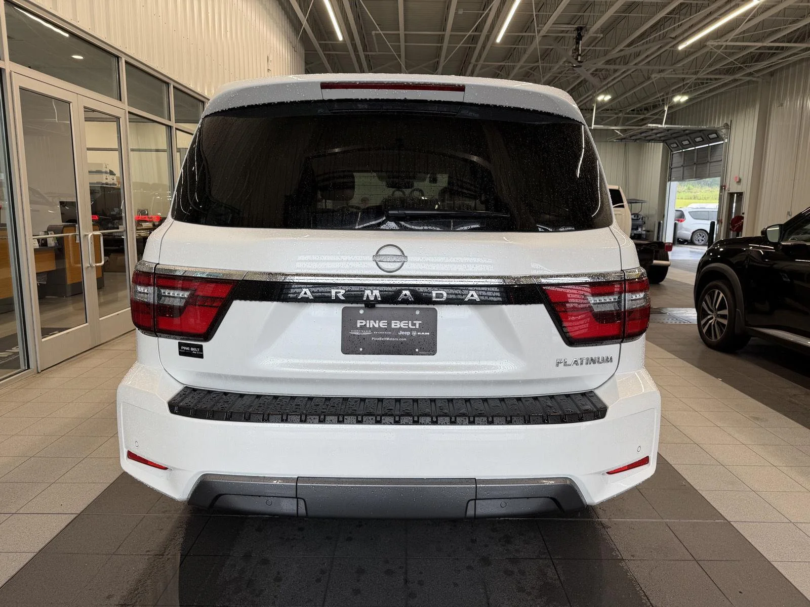 Used 2024 Aspen White Tricoat Nissan Platinum image 5