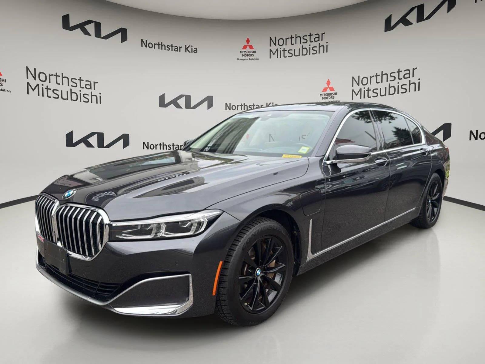 Used 2021 Dark Graphite Metallic BMW 745e xDrive image 1