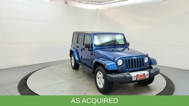 Used 2010 Blue Jeep Unlimited Sahara image 14