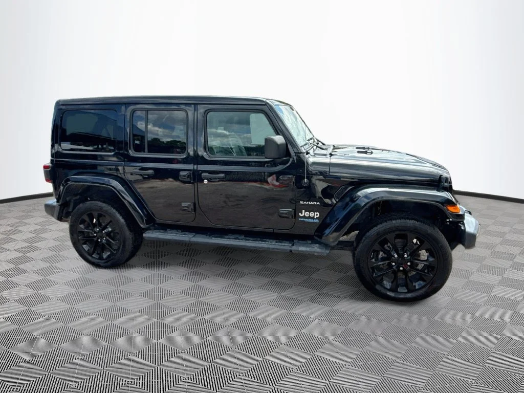 Used 2021 Black Jeep Unlimited Sahara 4xe image 5