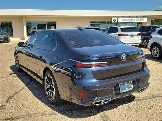 Used 2023 Carbon Black Metallic BMW i xDrive All-Wheel Drive image 2