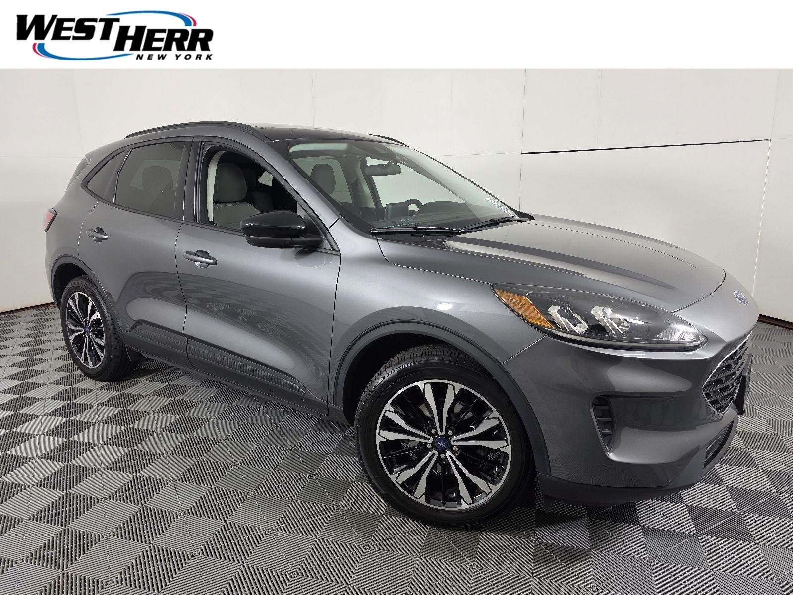 Used 2022 Carbonized Gray Ford SE image 1