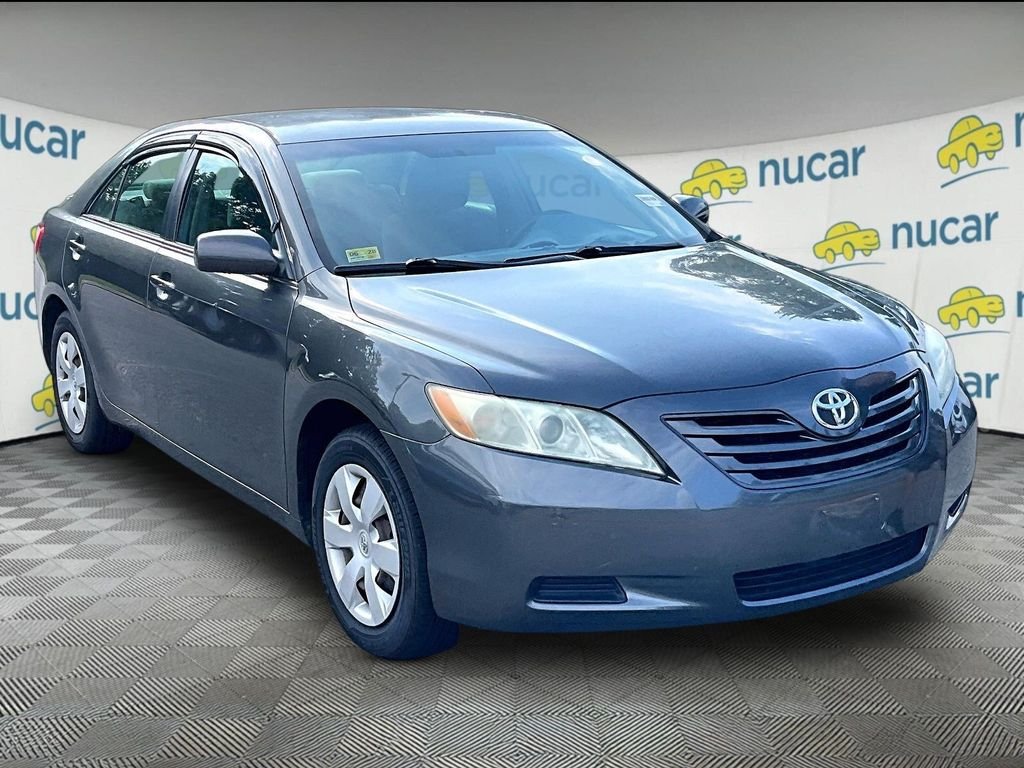 Used 2009 Gray Toyota LE image 1
