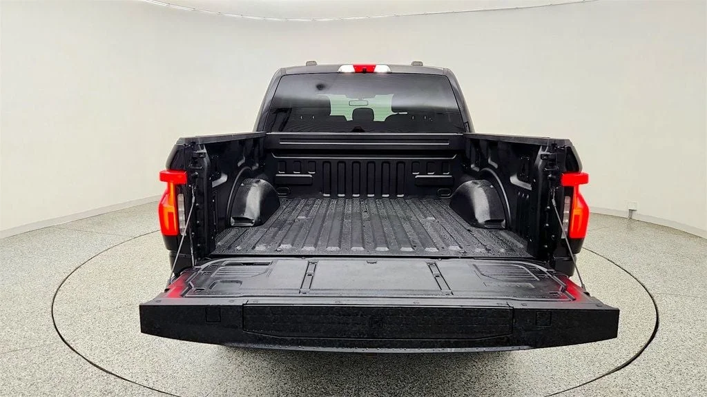 Used 2023 Agate Black Metallic Ford XLT 4WD SuperCrew 5.5