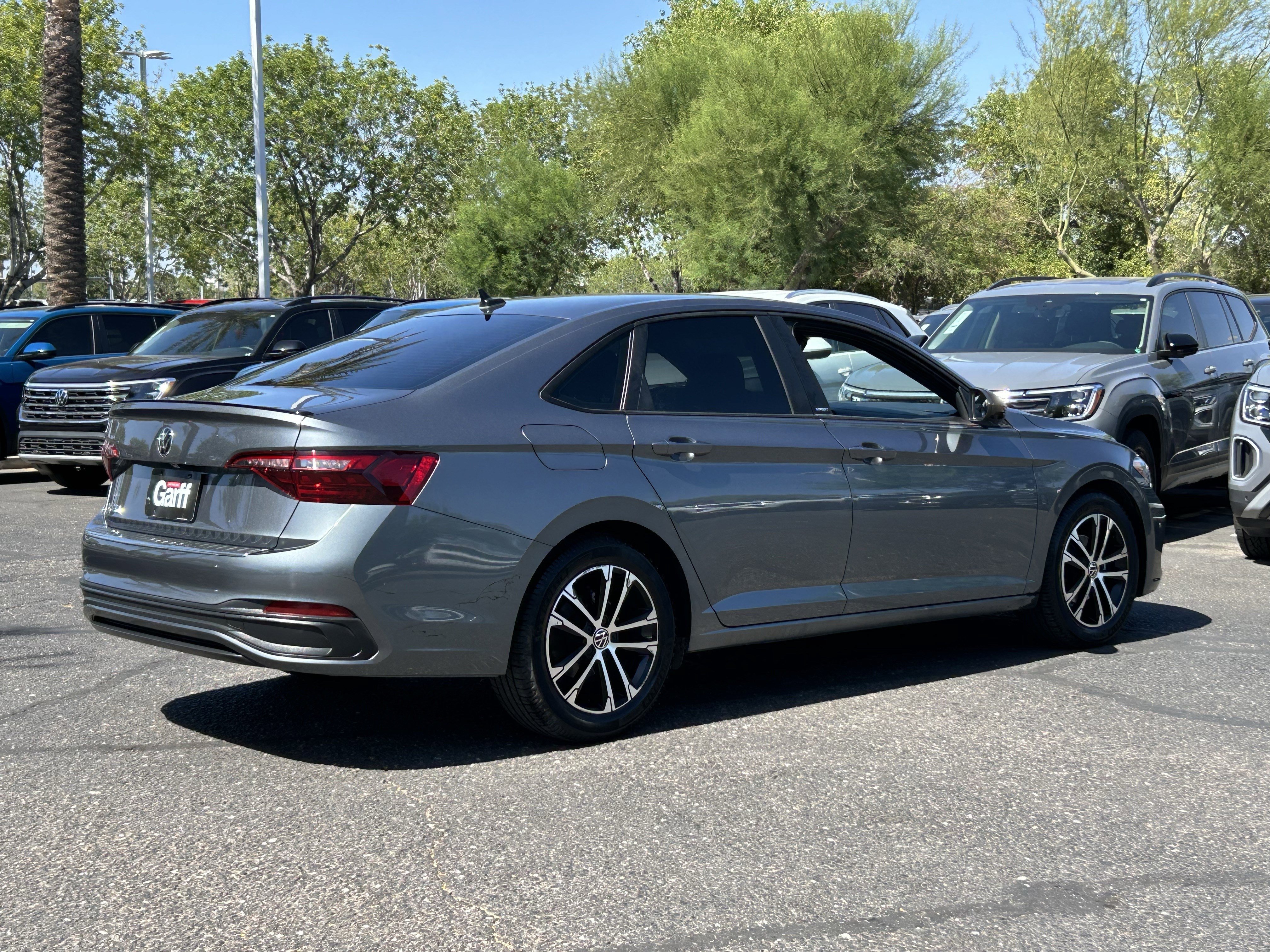 Used 2023 Platinum Gray Metallic Volkswagen Sport image 4