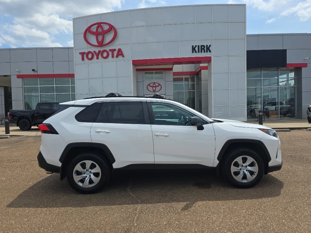 Used 2021 Super White Toyota LE image 1