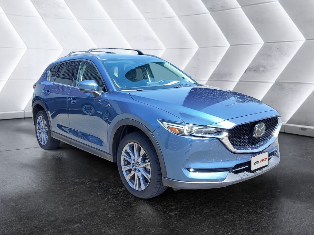 Used 2020 Blue Mazda Grand Touring image 1