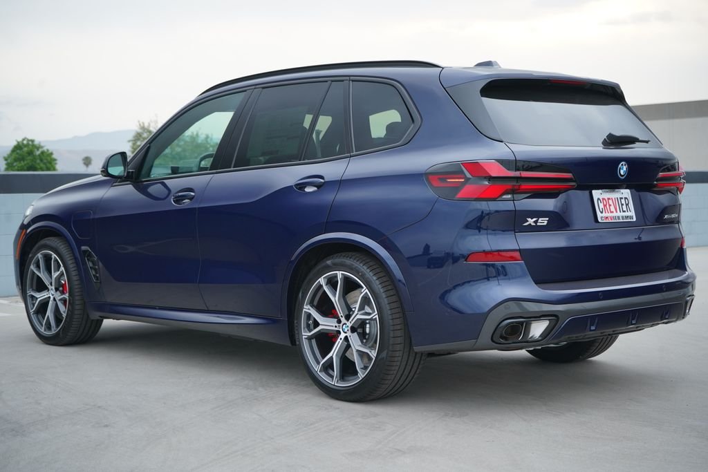 New 2026 Tanzanite Blue II Metallic BMW xDrive50e image 8
