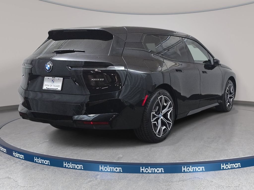 Used 2024 Black Sapphire Metallic BMW xDrive50 image 5