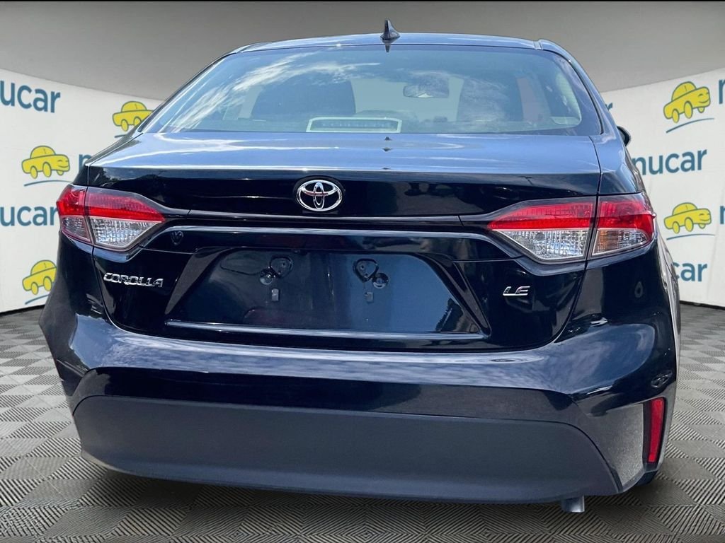 Used 2024 Black Toyota LE image 3