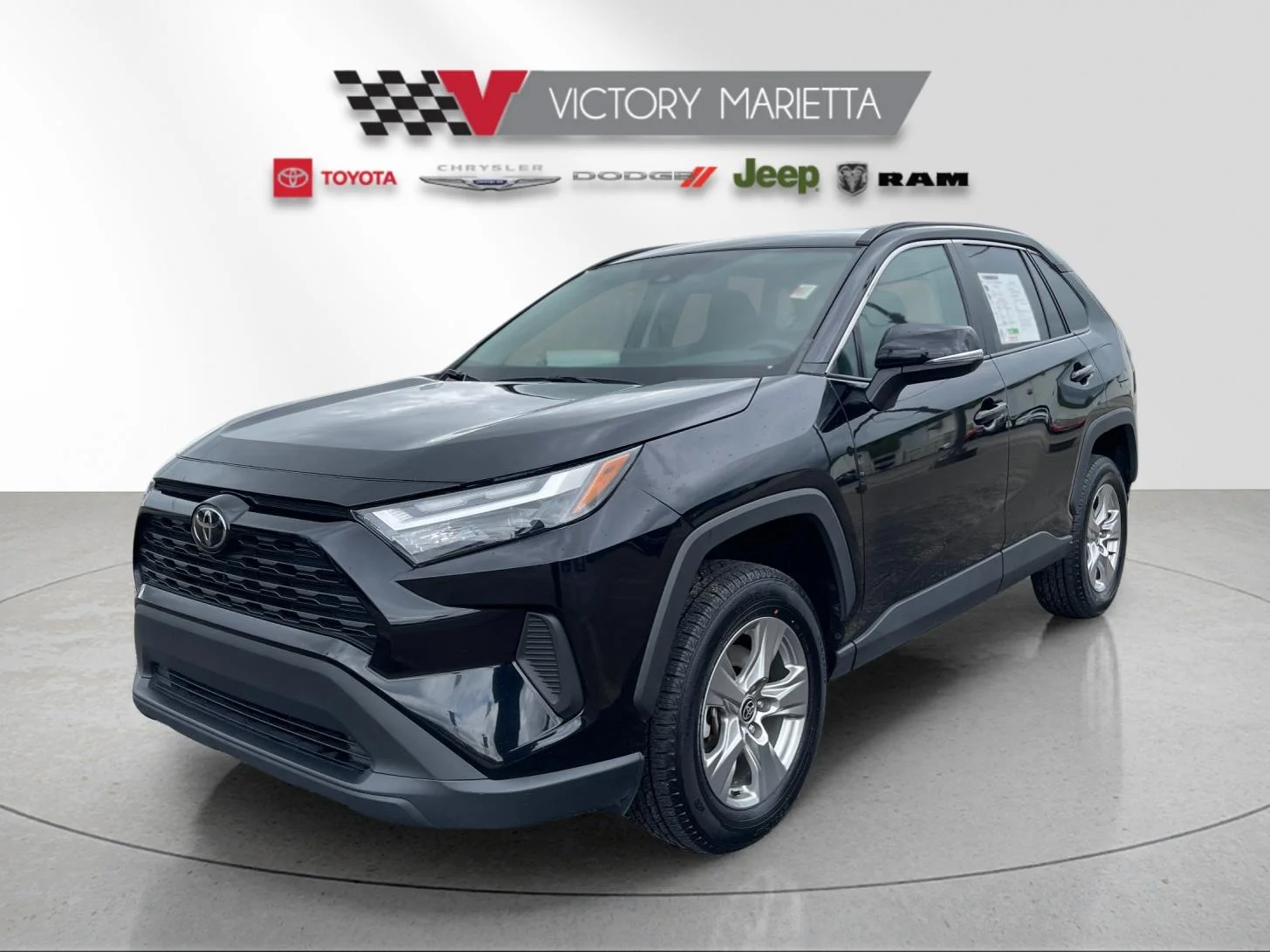 Used 2024 Black Toyota XLE image 1