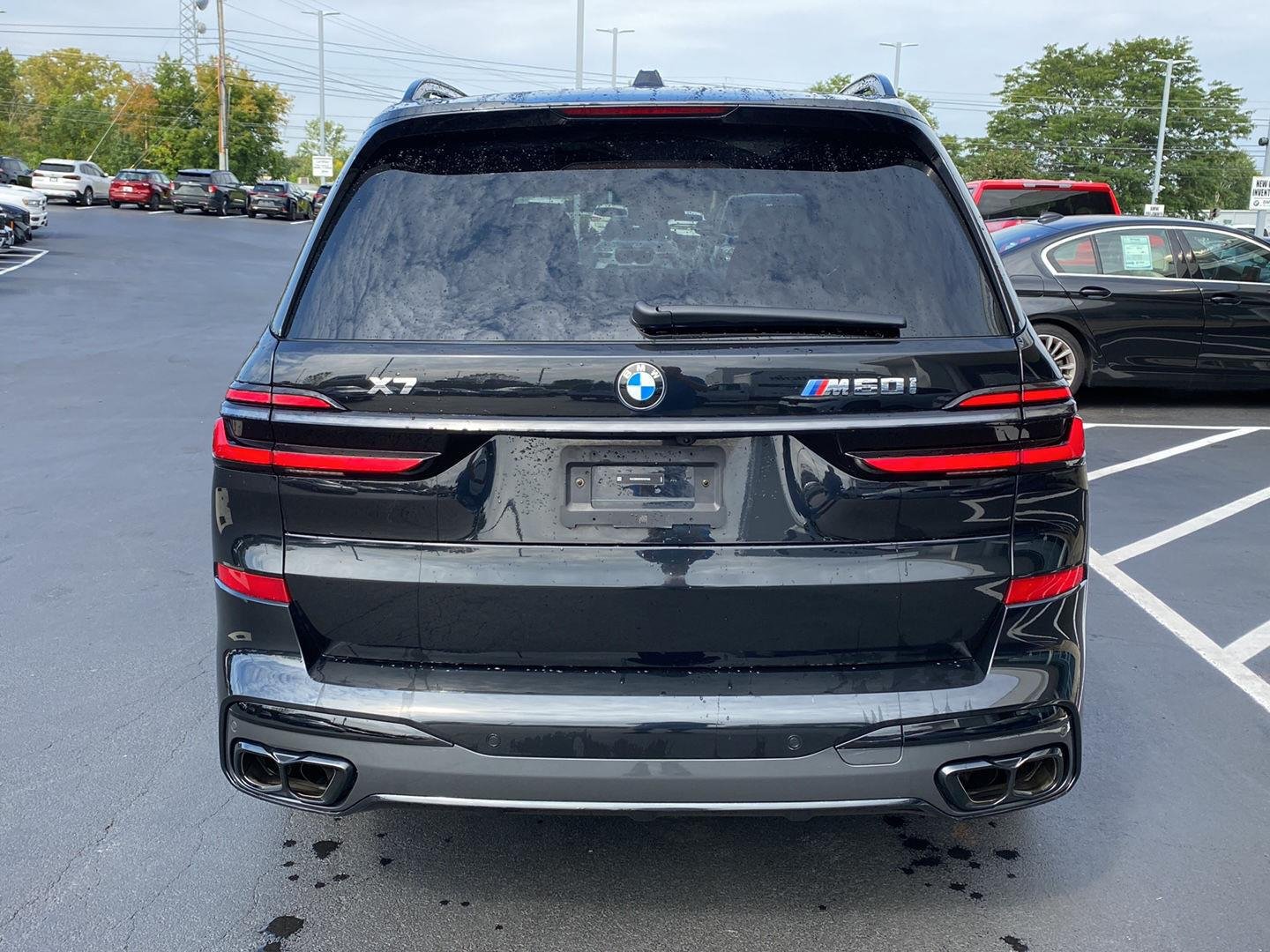 Certified Used 2024 Black Sapphire Metallic BMW M60i image 4