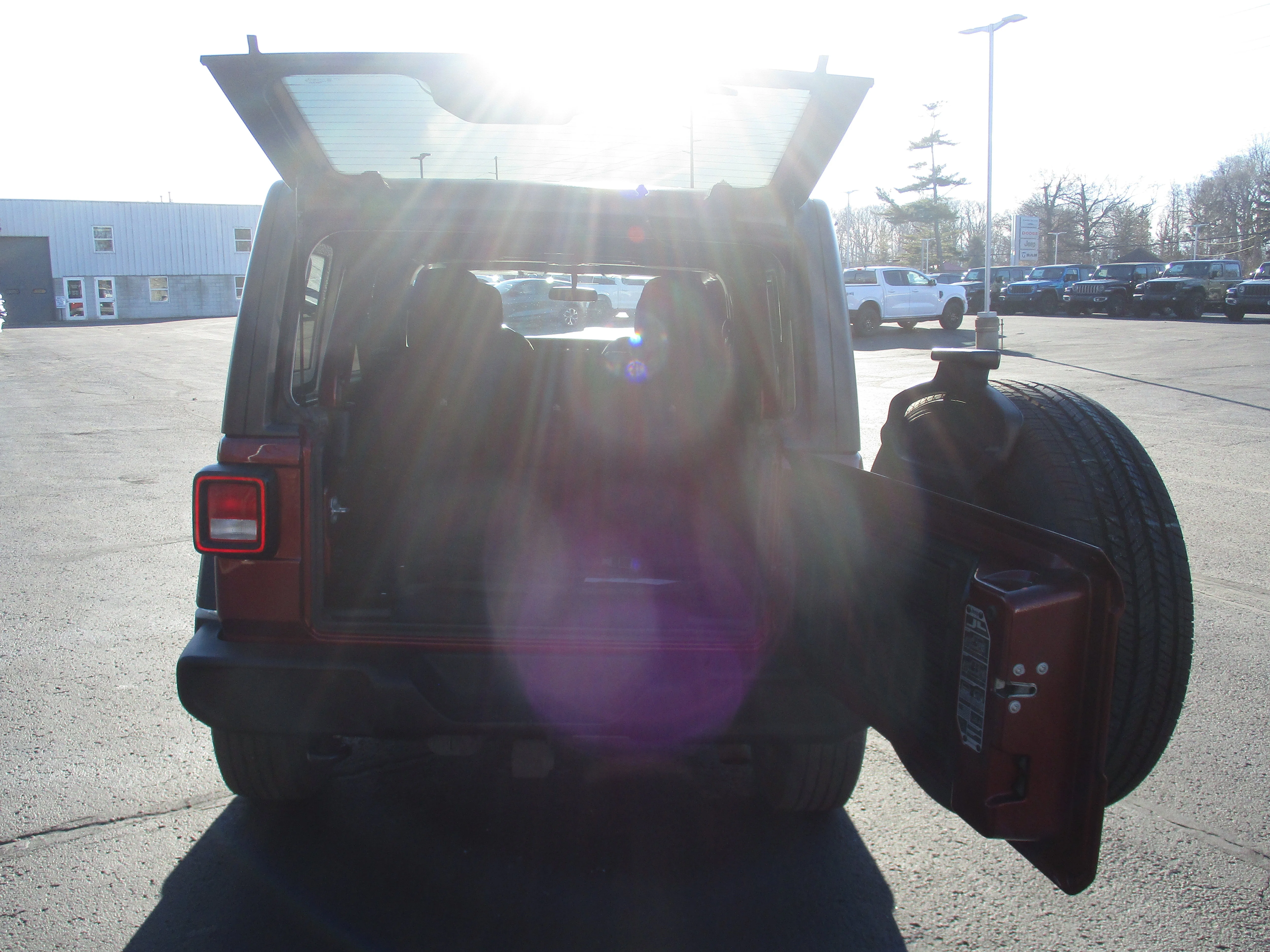 Used 2021 Snazzberry Pearlcoat Jeep Unlimited Sport Altitude image 13