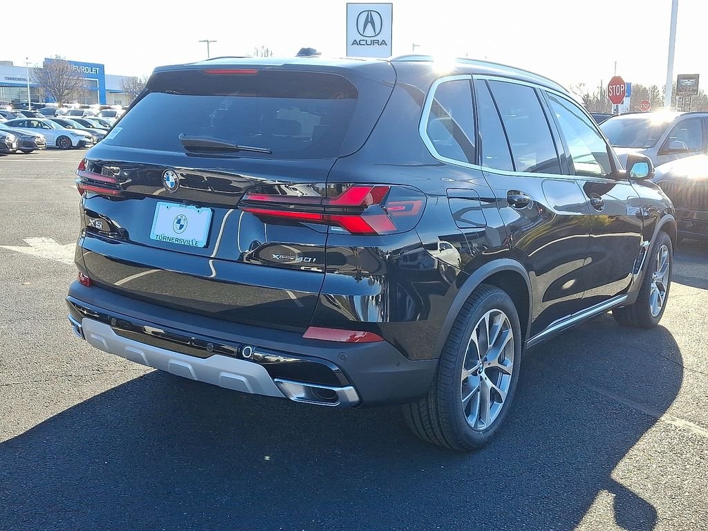 Certified Used 2026 Black Sapphire Metallic BMW xDrive40i image 4