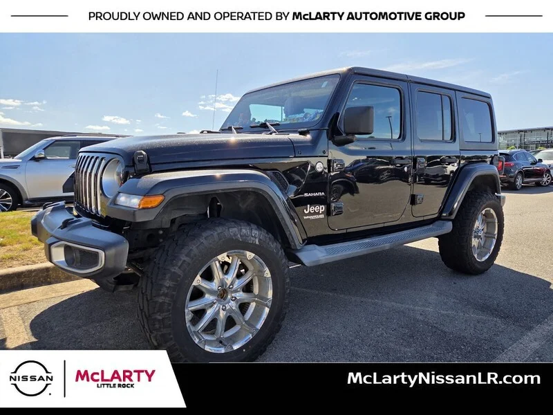 Used 2019 Black Clearcoat JEEP UNLIMITED SAHARA image 1