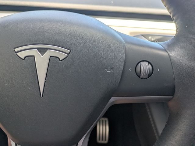 Used 2023 Solid Black Tesla Performance image 18