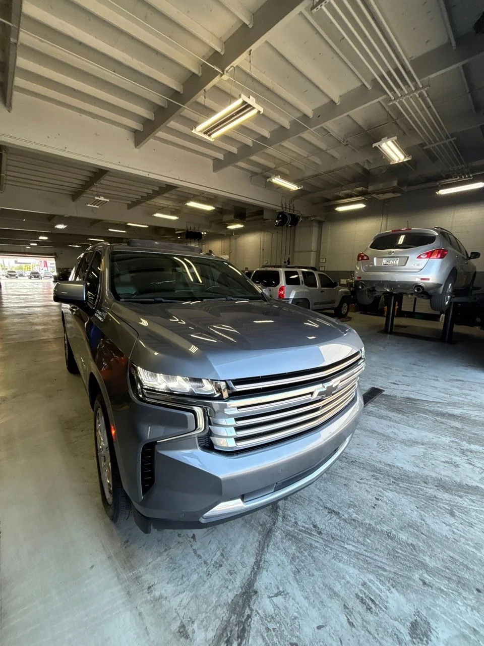 Used 2021 Satin Steel Metallic Chevrolet High Country image 1