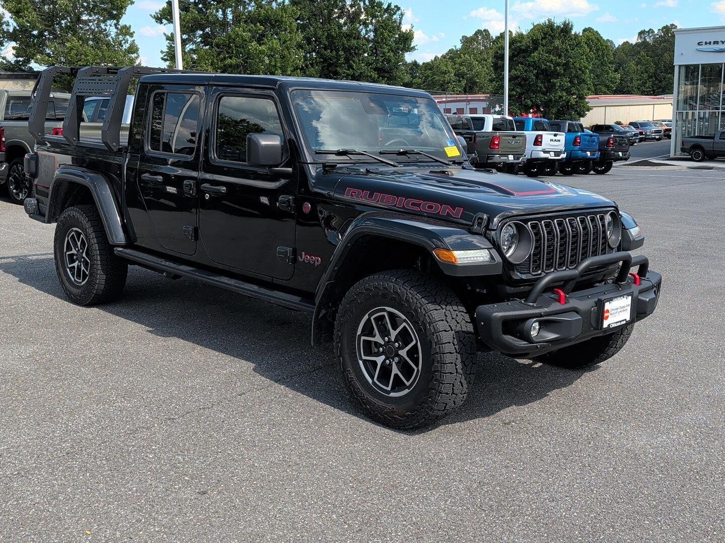 Used 2024 Black Clearcoat Jeep Rubicon image 1