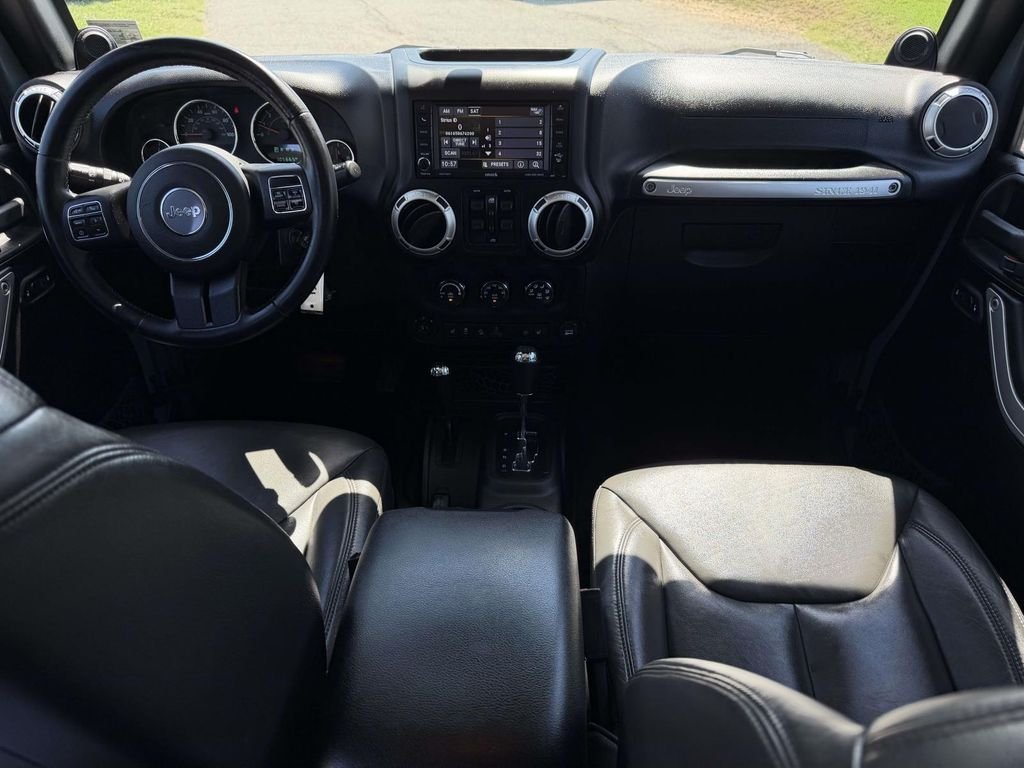 Used 2014 Gray Jeep Unlimited Sahara image 2