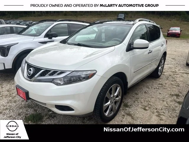 Used 2012 White Nissan LE image 1