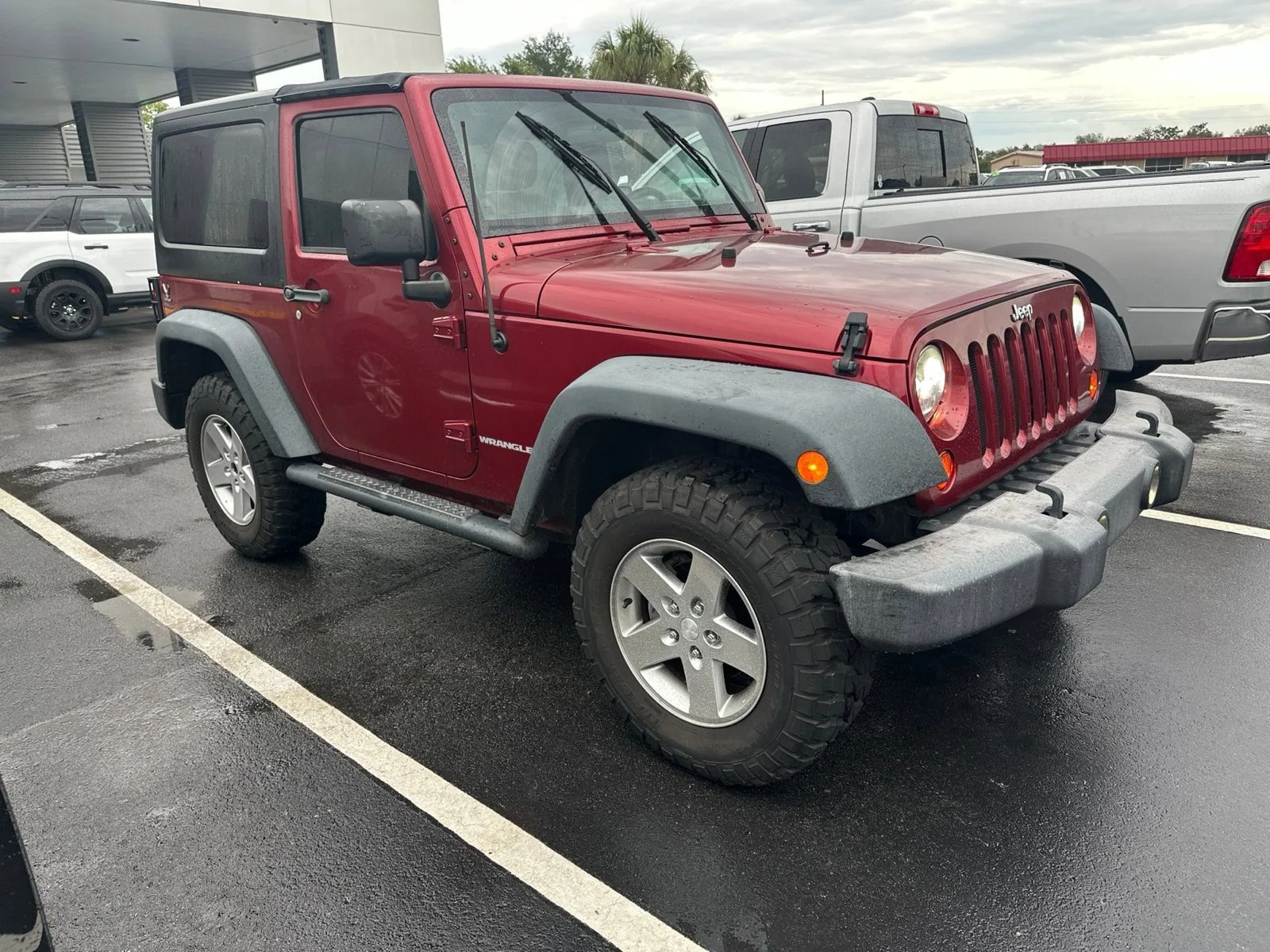 Used 2012 Red Jeep Rubicon image 1