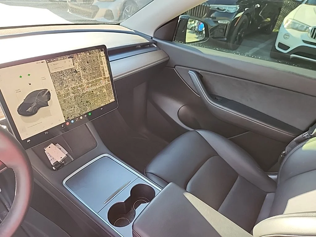 Used 2022 Solid Black Tesla Performance image 6