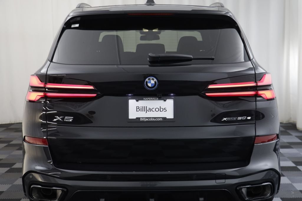 New 2026 Black Sapphire Metallic BMW xDrive50e image 17